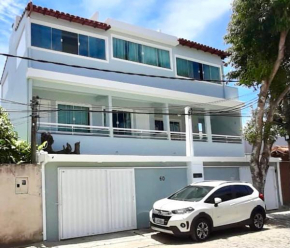 3 QUARTOS,10 min a pé Praia Grande, GARAGEM 3 carros, Churrasqueira, Wi-Fi e Cozinha Completa